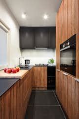 Kitchen, Ceramic Tile Floor, and Ceiling Lighting  Photo 4 of 16 in Best Kitchens by Dwell from TRIANGLE FLAT