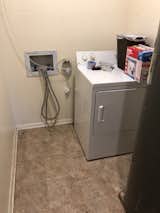The tiny laundry room was inefficient and crowded. 