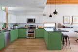 Kitchen, Subway Tile, Colorful, Accent, Medium Hardwood, Pendant, Microwave, Dishwasher, Range, and Undermount  Kitchen Undermount Microwave Dishwasher Colorful Medium Hardwood Range Photos from Bringing Light Into a Modest 1940s Bungalow in Austin