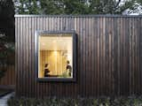 Exterior, House Building Type, Wood Siding Material, and Tiny Home Building Type  Search “family builds tiny backyard studio even tinier budget” from A Modern Micro-House in Portland Clad in Local Fir