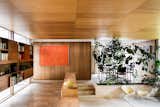 Living, Bookcase, Storage, Chair, and Travertine  Living Storage Travertine Photos from The Iconic, Midcentury Home That Peter Womersley Designed For Bernat Klein Asks $1.02M