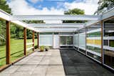 House, Wood, Metal, Concrete, Outdoor, Trees, Grass, Side Yard, Concrete, and Hardscapes  Outdoor House Metal Photos from The Iconic, Midcentury Home That Peter Womersley Designed For Bernat Klein Asks $1.02M