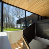 A Dramatic Cantilevered Roof Creates a Spacious Terrace Overlooking Lake Michigan - Photo 8 of 11 - 