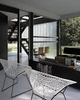 Living Room, Chair, Bench, and Bookcase  Photo 5 of 11 in A Fantastic Renovation in Belgium Rescues a Bauhaus-Inspired Home