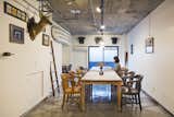 Office, Chair, and Concrete Floor Roam Tokyo Conference Room.  Search “conference” from Forget Coworking—These Coliving Spaces Let You Travel the World For $1,800 a Month
