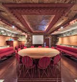 The Kiva Room, a half submerged underground space,  doubled as a Conference Room and Movie Theater for the Taliesin Fellowship.  Today, the space displays beauty and culture through craft and detailing.  