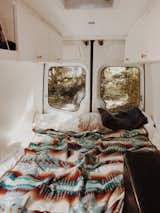 Bedroom, Recessed Lighting, and Bed A Pendleton wool blanket adorns the bed of a Mercedes Sprinter van.
  Photo 7 of 12 in These Digital Nomads Live, Work, and Travel in a Sprinter Van