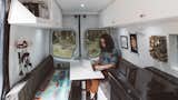 The interior of the van incorporated the couple's personal style.  Artwork and blankets also reflected their artistic aesthetic. 