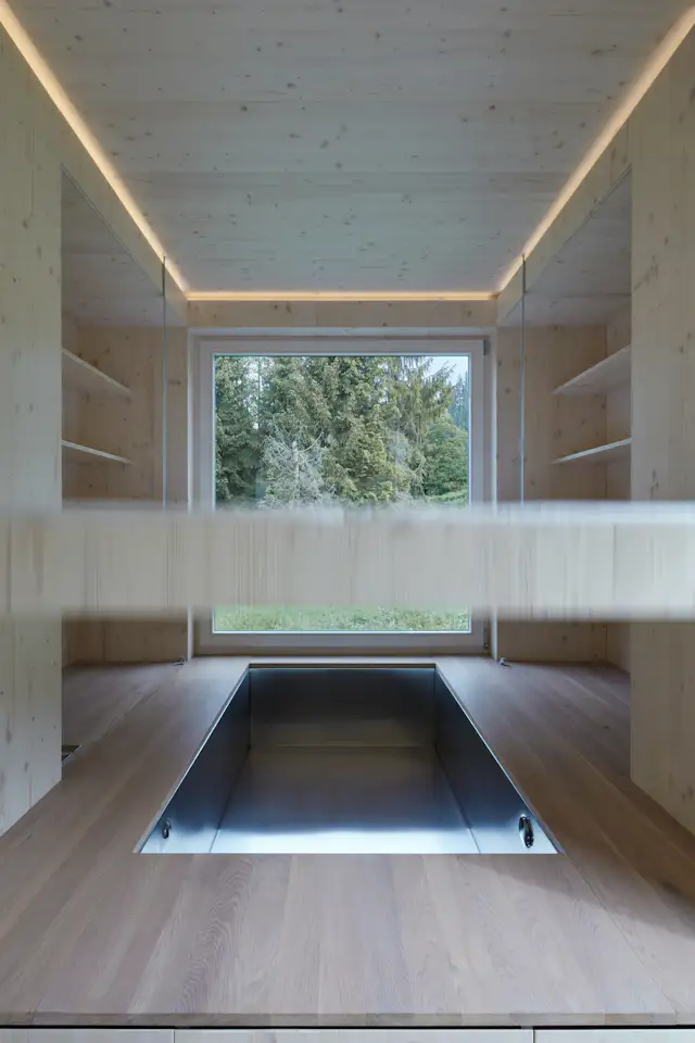 Image showcasing Photo 12 of 14 in This Off-Grid Prefab Cabin Boasts a Hidden Hot Tub ...