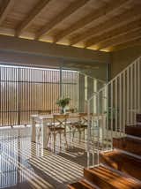 The wood shutters provide ever-changing patterns of light.  As the sun changes throughout the day, the light falls in diverse patterns through the light-filtering screens. 