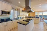 Ocean views can be enjoyed while cooking or entertaining from this chef's kitchen. 