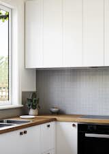 Simple joinery introduces contemporary details into the revamped kitchen space. 
