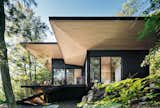 The large overhangs provide year-round comfort while adding a strong architectural element to the simple massing.
