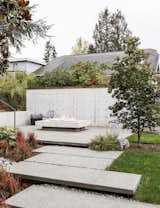 This remodel of a 1959 ranch-style house in Madison Park by SHED features new green space, an exterior deck for entertaining, and a built-in fire pit.&nbsp;