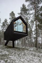 Nestled into a forested region of Finland near Salamajärvi National Park, the 387-square-foot Niliaitta cabin by Studio Puisto Architects is a modern adaptation of a traditional building type from nearby Lapland that serves as a safe place to store food outdoors in habitats with bears and other wild animals.&nbsp;