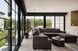Living room with yard and outdoor kitchen beyond
