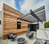  Second floor patio with pergola is shared by the whole family