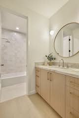Kid's bathroom number two is a shared concept with toilet / wet room tub and shower combination behind a lockable door