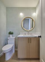 "Pistachio" lime wash by Portola with Artemide wall sconces.
