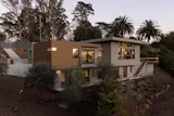 A view of the home while crossing the natural Swale