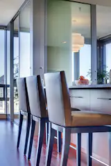 Stools from A.Rudin sit at the kitchen island.