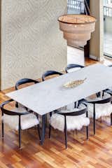 Dining Room, Medium Hardwood Floor, Ceiling Lighting, Light Hardwood Floor, Table, and Chair  Photo 4 of 25 in Lofty Living by Caroline@lindseyrunyondesign