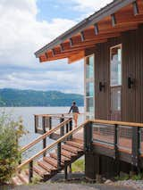 Outdoor, Woodland, Trees, Wood Patio, Porch, Deck, Metal Patio, Porch, Deck, and Hanging Lighting  Photo 2 of 4 in Ferris Cabin by Patano Studio Architecure