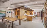 Dining & Kitchen Area showcasing flat panel cabinetry and custom milled oak trim throughout the home.