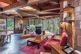 One is pulled from the entry across the room and through the mitered floor to ceiling windows to the grandness of nature beyond.  Trillium House.