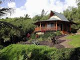 This Hawaiian bungalow by eco-friendly prefab builders Bamboo Living Homes embraces the native culture of the islands.