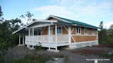 To add more space, this 640 square-foot prefabricated home comes equipped with cathedral ceilings. Extra living space is added with a wrap-around porch.  Photo 7 of 8 in 7 Hawaiian Prefabs and Kit Homes