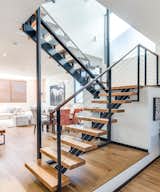 Staircase, Wood Tread, and Wood Railing  Photo 17 of 25 in Cloy Avenue Residence by Mayes Office