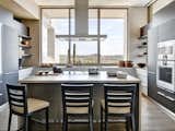 Bulthaup cabinetry and a concrete counter top offer a quiet and elegant frame to distant mountain views.