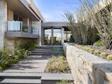 A destination entry transports visitors from the Sonoran desert to a peaceful, zen-inspired modern oasis at our Elegant Modern at Estancia project.