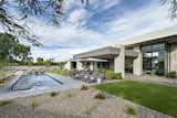 Architectural planes are differentiated using white and grey metal fascia in this modern retreat located in the award-winning community Kachina Estates in Paradise Valley. 