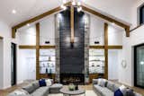 Black hot-rolled steel, limestone, and rift cut white oak are used throughout the residence for a modern and cohesive design.  