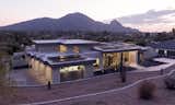 Modern architecture at its finest, this award-winning home was formerly described as a dated McMansion. Now a  modernistic retreat with a rooftop solar energy system, it's not only sustainable but architecturally distinctive.

Project Details // Now and Zen
Renovation, Paradise Valley, Arizona
Architecture: Drewett Works
Builder: Brimley Development
Interior Designer: Ownby Design
Photographer: Dino Tonn
Exterior limestone: Solstice Stone
Windows (Arcadia): Elevation Window & Door

https://www.drewettworks.com/now-and-zen/