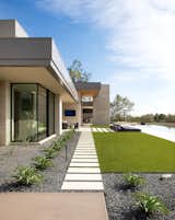 Intersecting limestone paths lead to the pool, and towering limestone-clad panels counteract the western sun of this modern desert home.

Project Details // Now and Zen
Renovation, Paradise Valley, Arizona
Architecture: Drewett Works
Builder: Brimley Development
Interior Designer: Ownby Design
Photographer: Dino Tonn
Exterior limestone: Solstice Stone
Windows (Arcadia): Elevation Window & Door

https://www.drewettworks.com/now-and-zen/