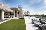 A flat stretch of turf is in perfect juxtaposition to the home's masterful architecture, which stands out for its generous limestone tablets and distinctive zinc fascia.

Project Details // Now and Zen
Renovation, Paradise Valley, Arizona
Architecture: Drewett Works
Builder: Brimley Development
Interior Designer: Ownby Design
Photographer: Dino Tonn

https://www.drewettworks.com/now-and-zen/