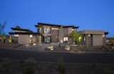 A rich blend of neutral colors and horizontal bands showcase the low-key ambiance of this contemporary residence once the sun goes down.

The Village at Seven Desert Mountain—Scottsdale
Architecture: Drewett Works
Builder: Cullum Homes
Interiors: Ownby Design
Landscape: Greey | Pickett
Photographer: Dino Tonn

https://www.drewettworks.com/the-model-home-at-village-at-seven-desert-mountain/