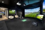 The subterranean "19th Hole" entertainment zone wouldn't be complete without a big-screen golf simulator that allows enthusiasts to practice their swing. 

The Village at Seven Desert Mountain—Scottsdale
Architecture: Drewett Works
Builder: Cullum Homes
Interiors: Ownby Design
Landscape: Greey | Pickett
Photographer: Dino Tonn

https://www.drewettworks.com/the-model-home-at-village-at-seven-desert-mountain/