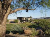 Nestled in the picturesque Sonoran Desert, the 10,000-square-foot golf course home radiates a modern aesthetic while taking full advantage of panoramic views.

The Village at Seven Desert Mountain—Scottsdale
Architecture: Drewett Works
Builder: Cullum Homes
Interiors: Ownby Design
Landscape: Greey | Pickett
Photographer: Dino Tonn

https://www.drewettworks.com/the-model-home-at-village-at-seven-desert-mountain/