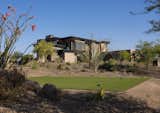 Situated on the 12th hole tee box at No. 7 at Desert Mountain golf course, this exquisitely designed desert modern residence offers luxury living with a casual lifestyle. 

The Village at Seven Desert Mountain—Scottsdale
Architecture: Drewett Works
Builder: Cullum Homes
Interiors: Ownby Design
Landscape: Greey | Pickett
Photographer: Dino Tonn

https://www.drewettworks.com/the-model-home-at-village-at-seven-desert-mountain/
