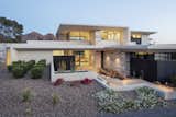 White plaster overhangs were paired with travertine massing components that provide contrast and anchor the structure to the site.

Project Details // Razor's Edge
Paradise Valley, Arizona
Architecture: Drewett Works
Builder: Bedbrock Developers
Interior design: Holly Wright Design
Landscape: Bedbrock Developers
Photography: Jeff Zaruba
Travertine walls: Cactus Stone

https://www.drewettworks.com/razors-edge/