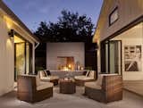 Cozy and inviting, there is an innate attraction between humans and fire. Relaxing and calming, here, you feel a ‘world away’ from the rest of the neighborhood when next to this fire pit. 