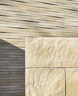 Lueders limestone was used extensively in the project and takes on many different forms ranging from cut stone pavers to monolithic load-bearing blocks to a special tapered profile that clads the main house. 