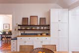 Inlaid flooring and wood countertops