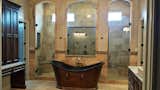 Arch top frameless doors and fixed panel 