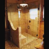 Bath Room, Brick Floor, Enclosed Shower, Corner Shower, Ceiling Lighting, and Stone Tile Wall Incredible pattern cut frameless enclosure by Anderson Glass  Photo 3 of 3 in Custom Frameless Shower Enclosure Projects by Dustin Anderson