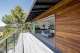 Large telescoping sliding doors open to bring the living room outside.